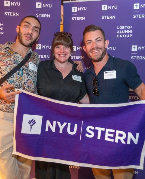 Alumni connect at an LGBTQ+ alumni event