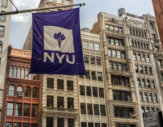 Alumni Resources & Benefits NYU flag against cityscape