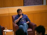 A photo of Professor Aswath Damodaran speaking at an event.