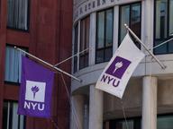 NYU flags outside of the Henry Kaufman Management Center NYU flags outside of the Henry Kaufman Management Center