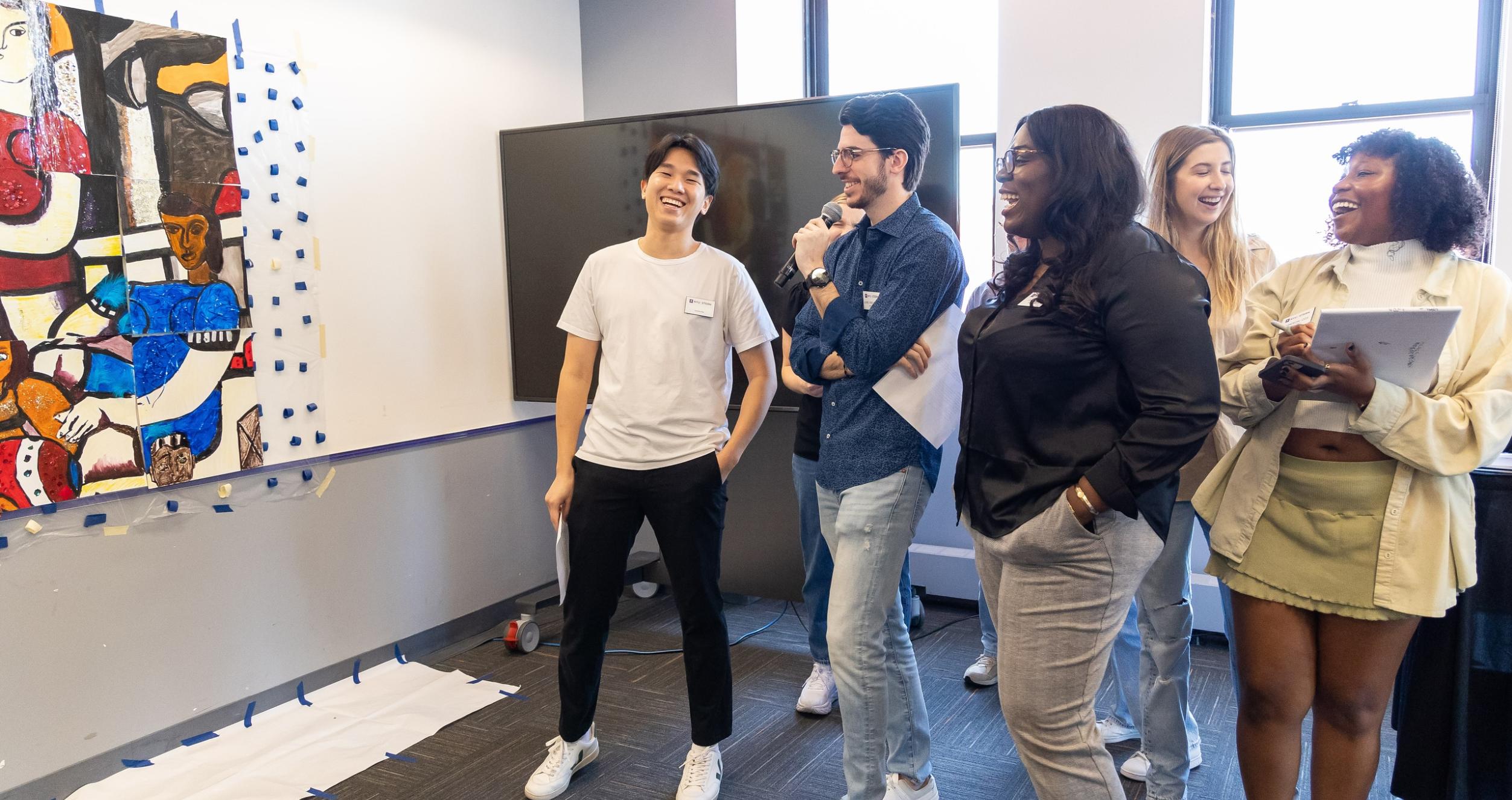 Students Laugh at Focused Orientation