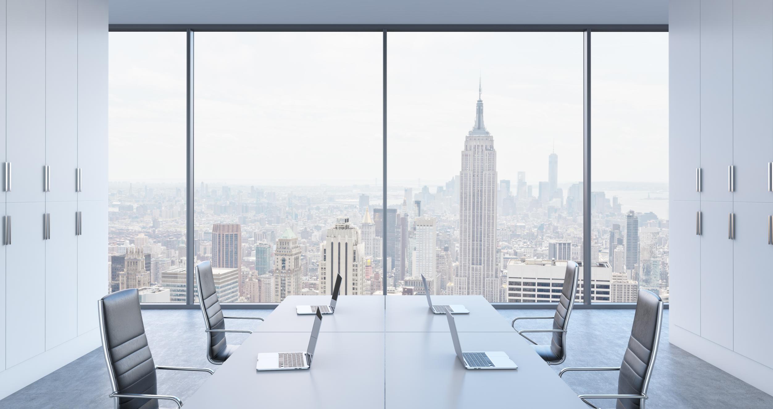 A conference room overlooking the New York City skyline