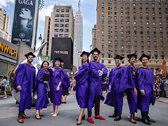 Sternies in caps and gowns at MSG