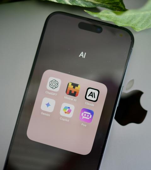 A cell phone with shortcuts for several popular AI services.