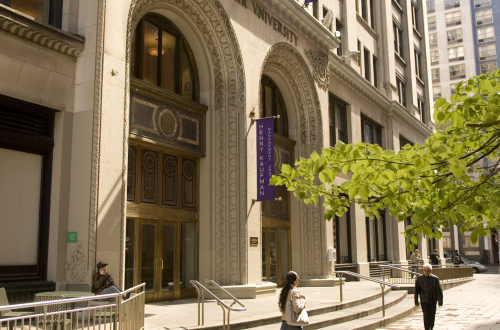 NYU Stern's Kaufman Management Center building view of an nyu building on a sunny day