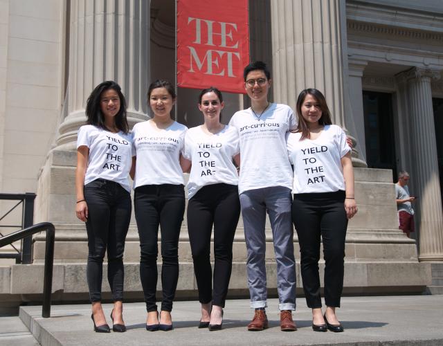 Five students standing in front of the Metropolitan Museum of Art