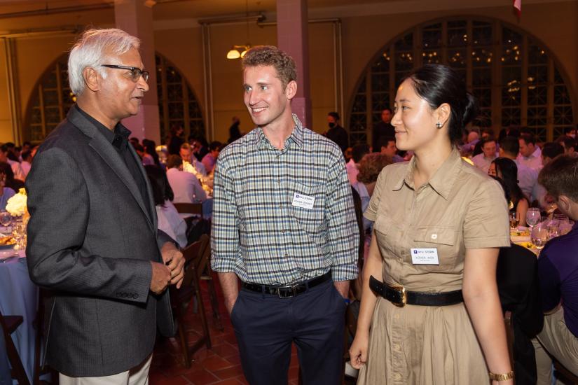 Dean Raghu Sundaram poses with alumni