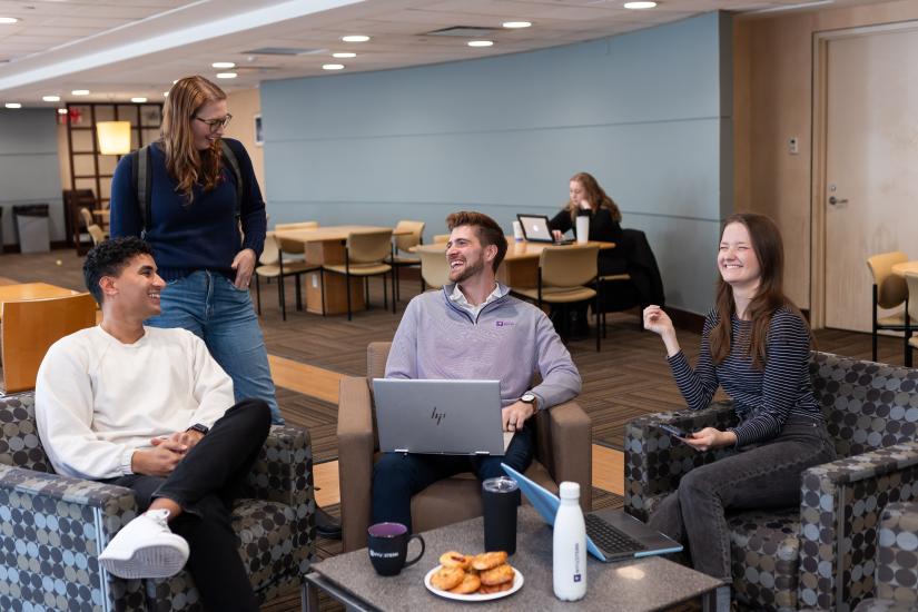 MBA students hanging out in the grad student lounge
