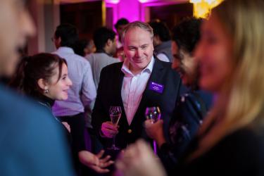 Frank Dejonckheere (MBA ’00), founder of Andleye Capital [center] at an alumni event in London  