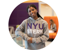 Student posing in a grey NYU Stern hoodie